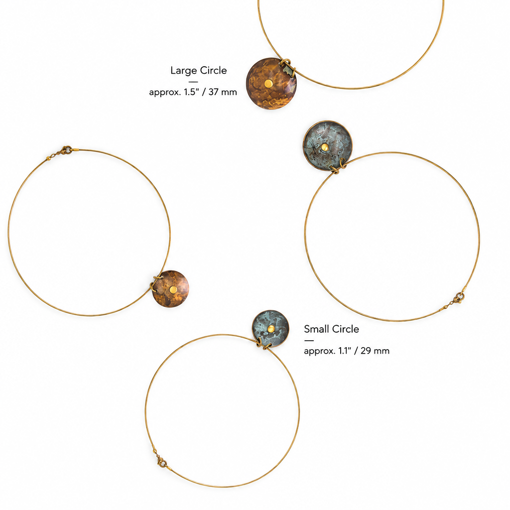 Oxidised brass circle pendant size guide: small circle approx. 1.1 inches / 29 mm; large circle approx. 1.5 inches / 37 mm.