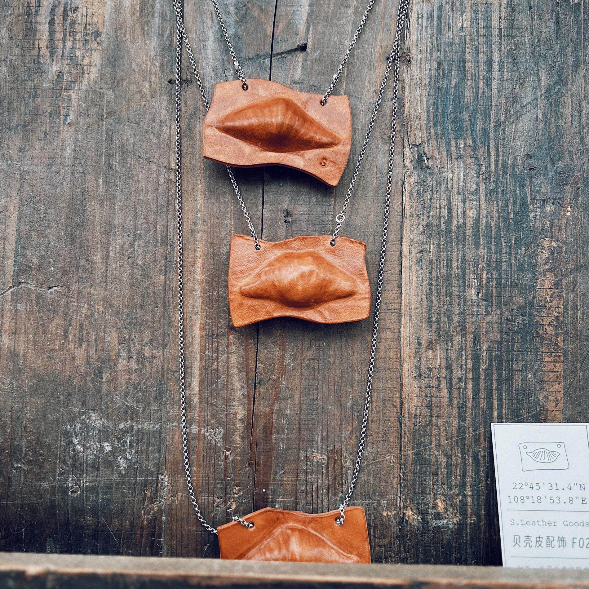 Fossil Shell Leather Pendant Necklace F02 - full outfit shot with overcoat