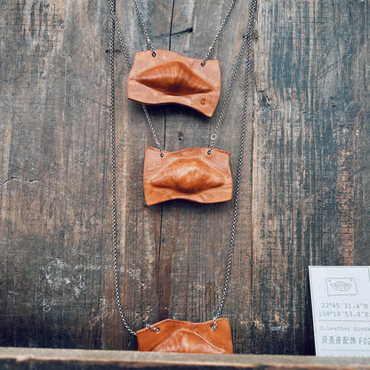 Fossil Shell Leather Pendant Necklace F02 - full outfit shot with overcoat