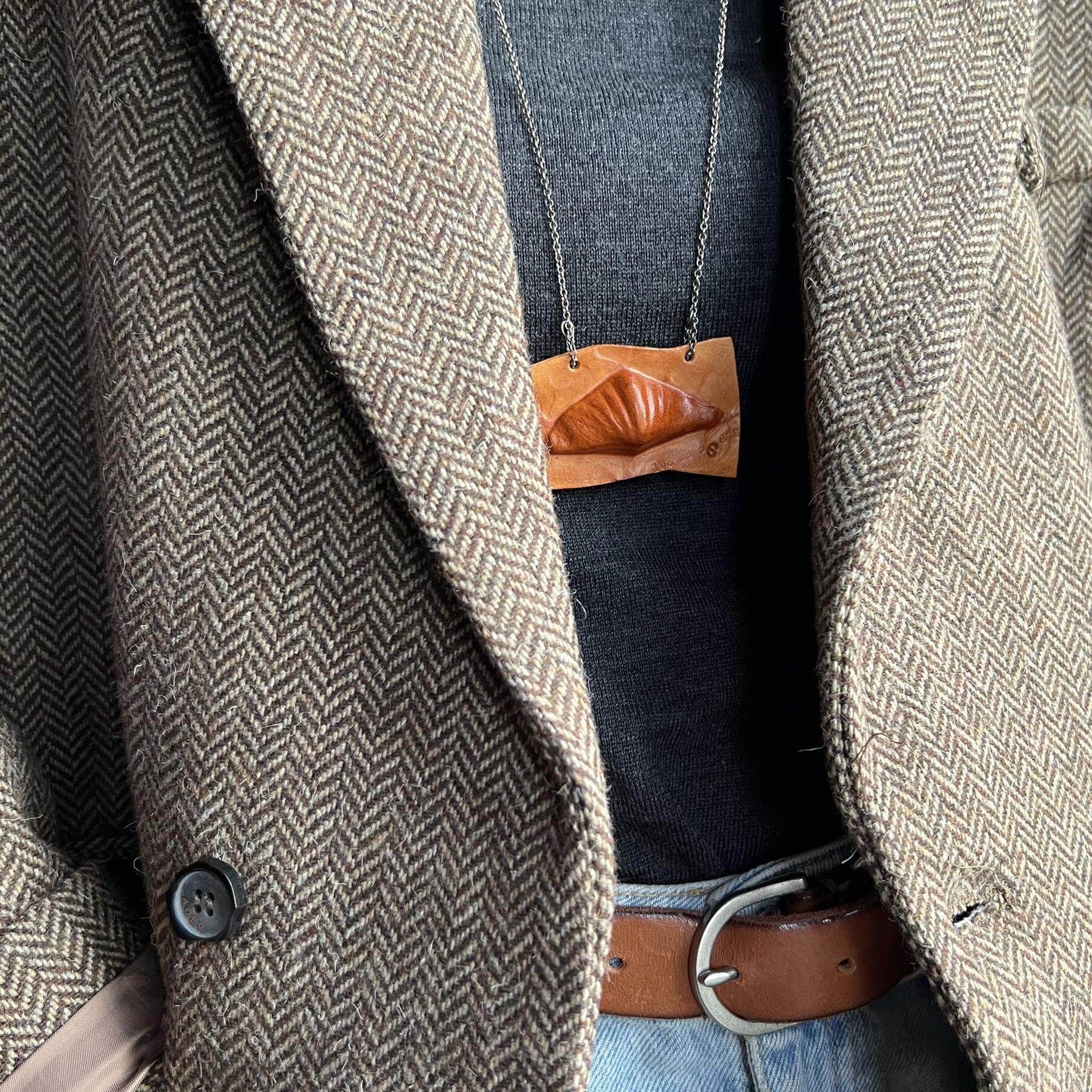 Fossil Shell Leather Pendant Necklace F02 - worn with herringbone blazer detail