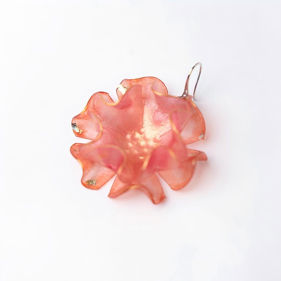 Devoted coral pink leather flower earring product shot showing single piece, approx 4cm diameter with gold foil accents