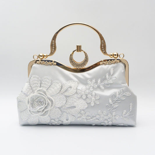 Hand-embroidered camellia dinner bags